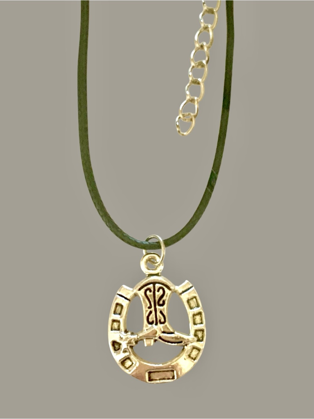 Silvertone Horseshoe & Boot Charm Necklace on black Cord